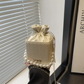 Elegant cream bucket bag with pearl handle and woven texture detail for women - Beige