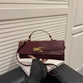Elegant wine red baguette bag with crocodile pattern and golden lock clasp - Red