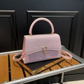 Sparkly pink glitter handbag with golden horseshoe clasp and structured top handle - Pink