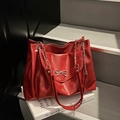 Large red tote bag in oily leather texture with silver chain and bow detail - Burgundy