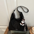 Schwarze Tragetasche mit Leopardenmuster, verstellbarem Gurt und Hundeanhänger - Mit Anhänger / Schwarzer Leopard