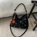 Black suede hobo bag with silver grommets and colorful pompom, styled as a crossbody - Without Pendant / Black