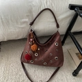 Dark brown suede tote bag with metal grommets and colorful pom-pom charm detail - Without Pendant / Brown