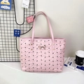 Borsa tote rosa con motivi a fiocco nero e dettaglio fiocco in metallo dorato - Rosa