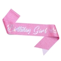 Close-up of glittery pink Birthday Girl sash with silver artistic lettering and crown - Girl-Pink