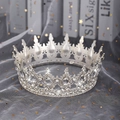 Close-up of silver bridal crown with intricate rhinestone patterns on star tulle - Silver Base-All White