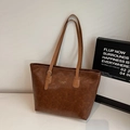 Dark brown oil wax leather tote bag with adjustable shoulder strap and fashion branding - Brown