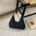 Retro black snakeskin texture half-moon underarm bag with silver zipper in a lifestyle set - Black