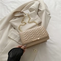 Elegant beige V-quilted chain bag with gold hardware for a chic urban style look - Khaki