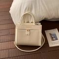 Creamy white woven patchwork handbag with leather trim and adjustable crossbody strap - No Pendant / White