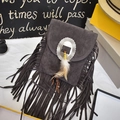 Dark grey bohemian tassel crossbody bag with feather charms and metal concho buckle - Gray