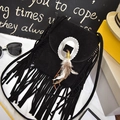 Bohemian black crossbody bag with long fringes, silver buckle and feather pendant - Black
