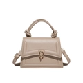 Elegant beige leather trapezoid handbag with gold rotary buckle and knotted handle detail - Khaki