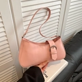 Chic pink baguette underarm bag in matte leather finish featuring silver buckle accent - Pink