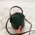 Vintage water-emmer tas in donkergroen mat leer met bruine details en goud - Groen