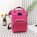 Mochila rosa de tela Oxford con cremalleras amarillas en contraste y asa superior - Rosa Rojo