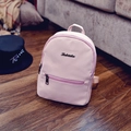 Pink minimalist PU leather mini backpack with metal lettering and front zip pocket - Pink