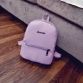 Schicker helllilane Mini-Rucksack aus PU-Leder mit Litschi-Struktur und Logo-Detail - Lila