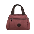 Reisetasche aus weinrotem Canvas mit braunen Griffen und runder Leder-Markenplakette - Rot