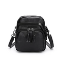 Fashionable black multi-pocket crossbody bag in textured PU leather with adjustable strap - Black