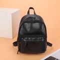 Classic black leather backpack for women with pebbled texture and fringe zipper details - Black