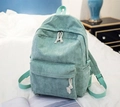 Mint green corduroy backpack for students featuring unique texture and rope zippers - Green