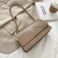 Chic beige crocodile pattern baguette shoulder bag with gold hardware and flap closure - Khaki