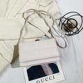 Beige padded block crossbody bag with chic quilted texture and thin shoulder strap - Off White