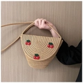 Detail of straw woven crossbody bag featuring three red cherry appliques and thin rope strap - Khaki (Cherry Embroidery)