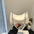 Chic white half-moon hobo bag with chunky silver chain and minimalist faux leather finish - White