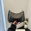 Minimalist black hobo shoulder bag with matte finish and silver chunky chain detail - Black