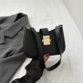 Minimalist black leather underarm bag with gold metal clasp and sleek shoulder strap - Black
