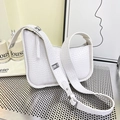 White faux leather crocodile pattern shoulder bag with wide strap and silver buckle - White
