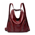 Zaino multifunzionale in pelle PU rosso scuro con borchie argentate e targhetta in metallo - Rosso