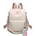 Chique beige oxford rugzak met roze bandjes en een kleurrijk franje-accessoire - Broken Wit