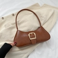 Vintage brown crescent shoulder bag with large golden buckle and faux leather finish - Tan