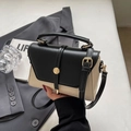 Bolso bandolera retro bicolor en negro y crema con cierre de metal dorado - Negro