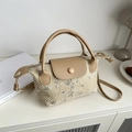 Woven straw handbag with floral embroidery and PU leather flap for summer fashion - Khaki