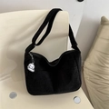 Black corduroy shoulder bag featuring a cute white puppy pendant accessory - Black With Pendant