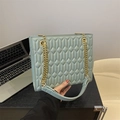 Light blue quilted chain shoulder bag with gold hardware and chic faux leather finish - Green