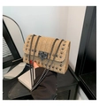 Straw woven crossbody bag with metallic studs and chain strap in beige finish - Khaki