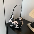 Chic cow print crescent hobo bag for women with golden hardware and leather strap - Cow Print