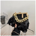 Chic black sequin crossbody bag featuring a chunky gold chain and metal frame closure - Black