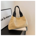 Large woven straw tote bag with black fabric handles shown on a minimalist background - One Size / Khaki with Black Ribbon