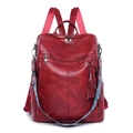 Zaino retrò in pelle PU rosso scuro con ampia tracolla in stile etnico e nappe - Rosso