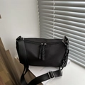 Minimalist black nylon crossbody bag with wide strap and decorative chain detail - Black