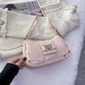 Pink glossy faux leather underarm bag with a heart buckle and silver rivets decoration - Pink