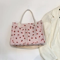 Rosa Cord-Einkaufstasche mit Erdbeerdruck, zwei Vordertaschen und verstellbarem Gurt - Rosa