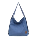 Blue denim canvas hobo bag with leather logo patch and versatile shoulder strap - Dark Blue