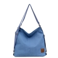 Minimalist blue canvas tote bag with adjustable shoulder strap and leather logo patch - Light Blue